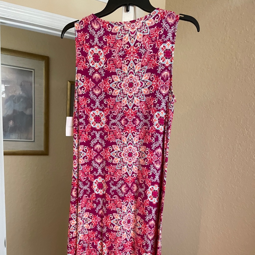 Pink patterned dress.